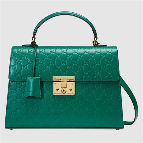 gucci green shopping bag.